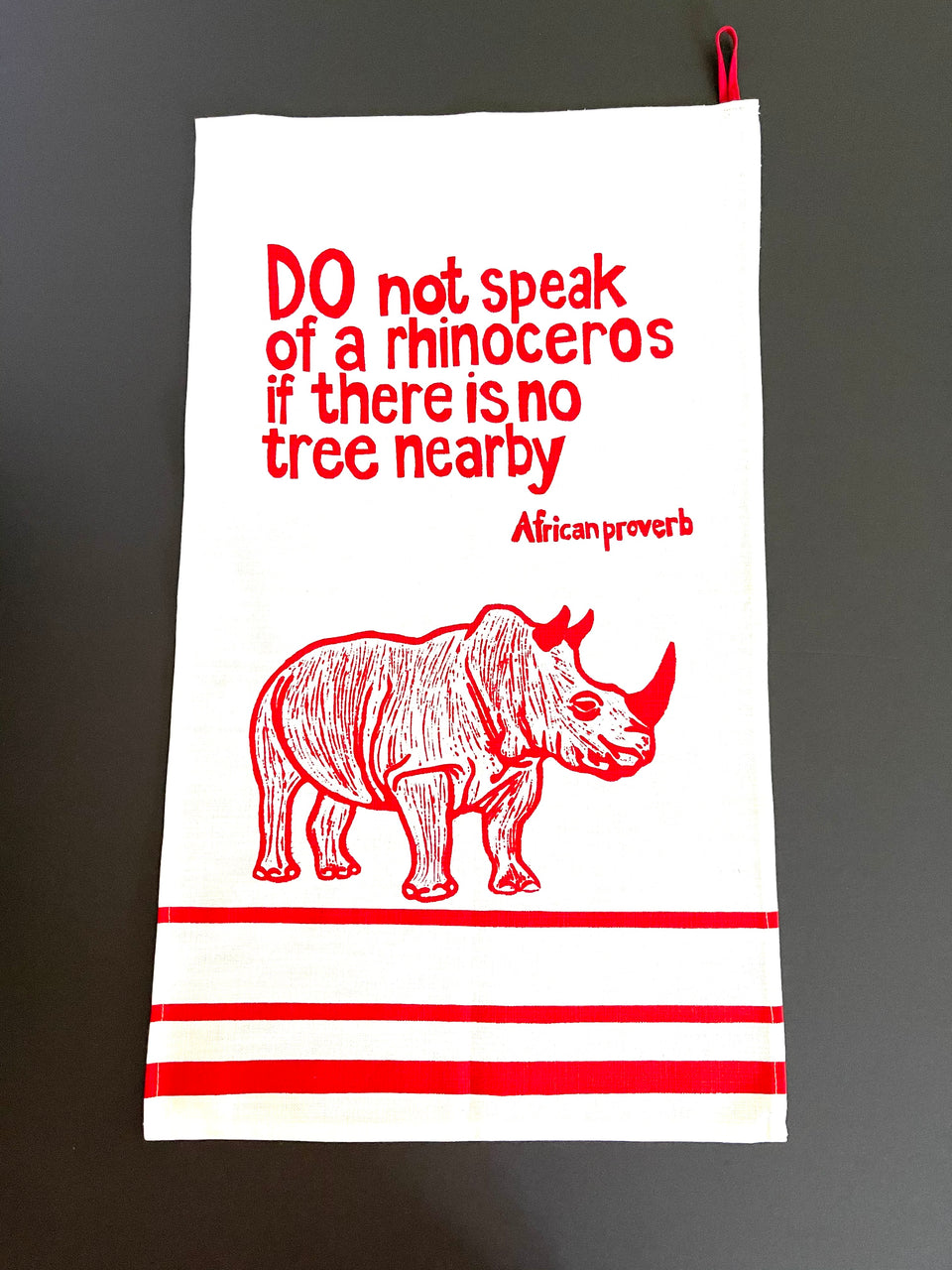 "Do Not Speak Of A Rhinoceros" African Proverb Tea Towel